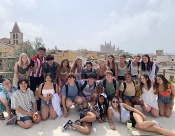 Group of high school students posing in front of a museum in Palma de Mallorca