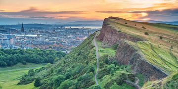 Edinburgh Salisbury Crags in Holyrood Park and downtown Edinburgh