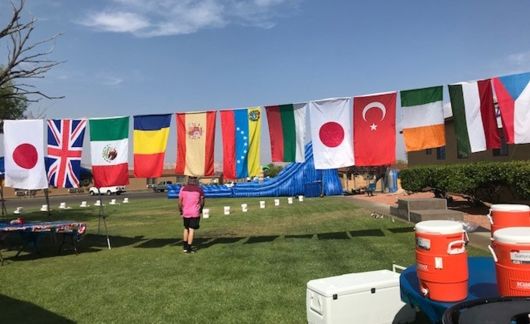 flags of different countries hanging outside