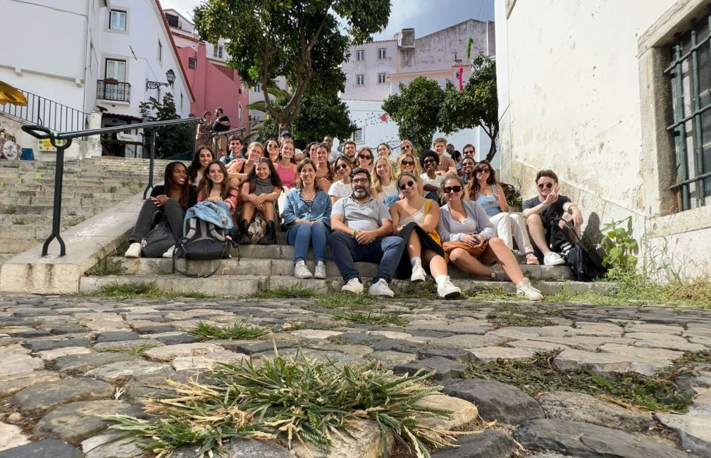lisbon portugal students sit steps