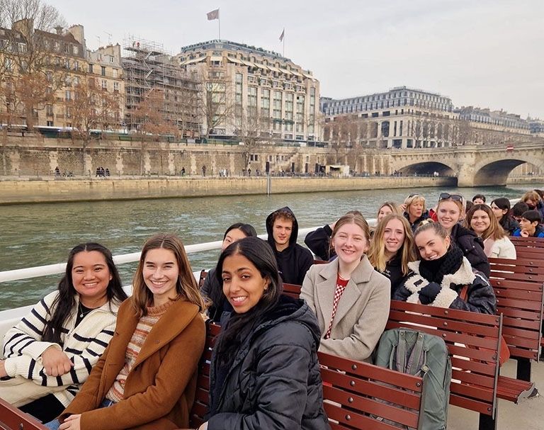student boat tour on river abroad