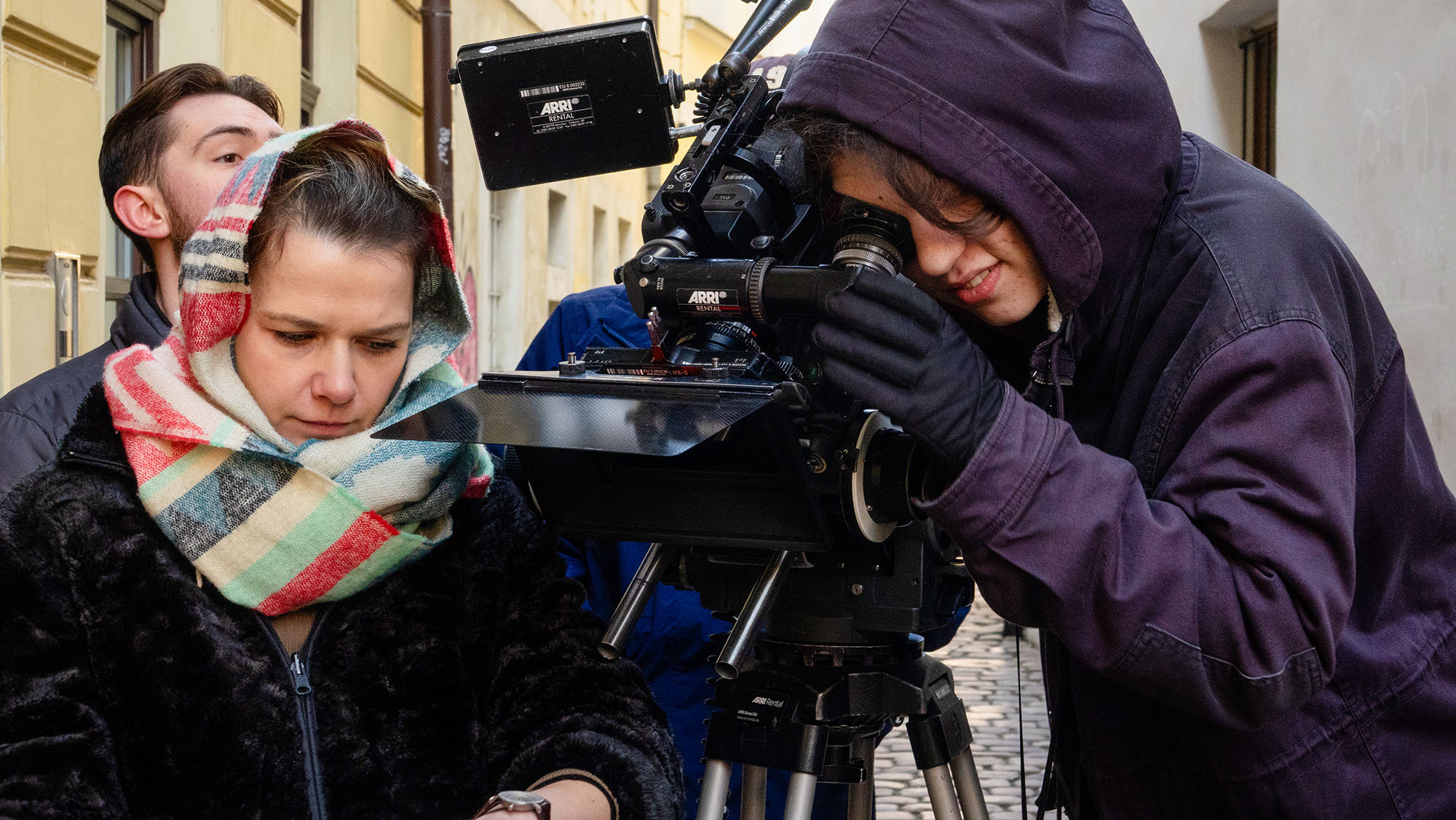 Prague Film Studies students operating a film camera