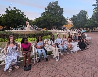 Students meet in the park before dinner