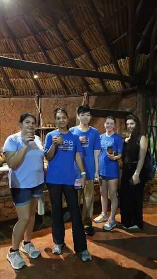 Students sample a traditional Maya chocolate drink