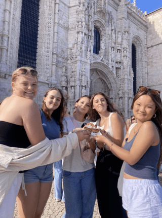 students eating pastel de nata in Belém