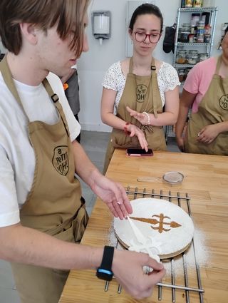 Jaden removes cross from powdered cake