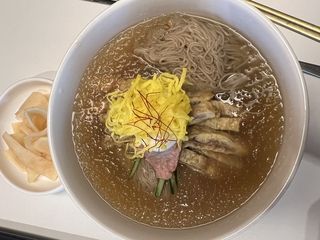 Bowl of naengmyeon with toppings