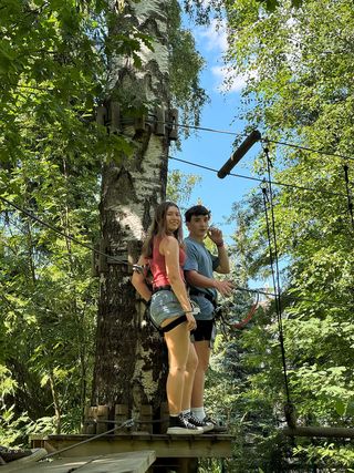 Students ziplining on high school summer abroad program