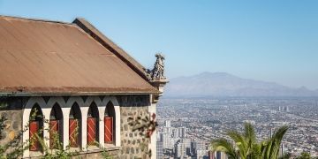 santiago dr gargoyle over city