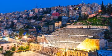 roman amphitheater at night in amman, jordan