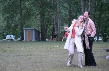 two female colleagues working together laughing