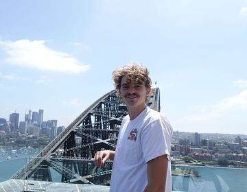 Student participant enjoying Sydney bridge view