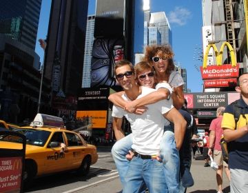 students piggyback in new york city