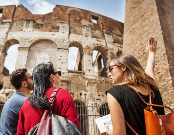 rome colosseum group looking up