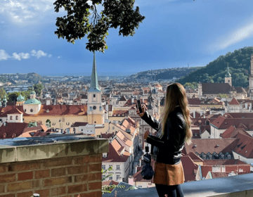 prague student overlooking city by center