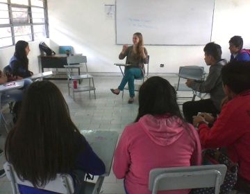 Teacher and students in classroom in Mexico