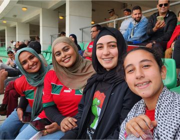 students soccer match abroad middle east