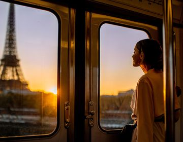 paris-professional-woman-on-train-eiffel-tower-view