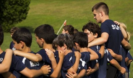 Summer camp team huddle