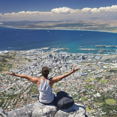 cape town overlook student arms spread