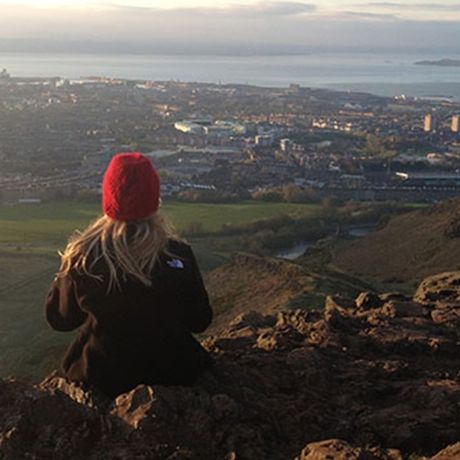 student overlooking edinburgh foggy day