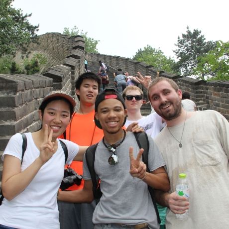 china peace sign great wall student climb