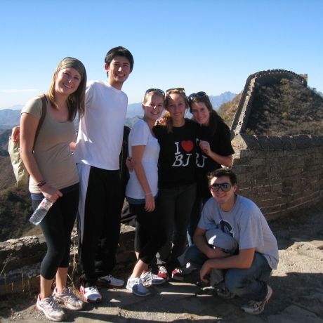 great wall of china students climb