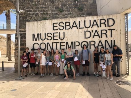 High school students posing against wall in Palma de Mallorca
