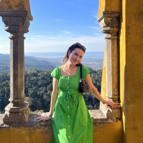 yellow wall student smiling abroad lisbon