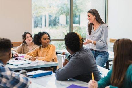 female teacher with teenage students