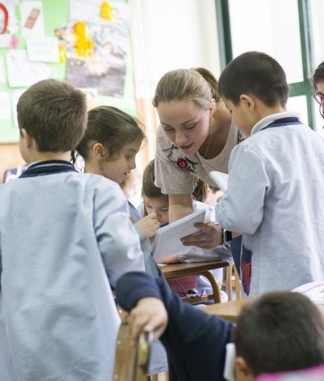 Language assistant teaching students in class