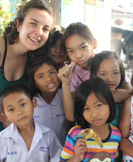 Teacher and students posing for a photo