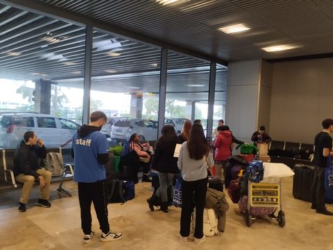 volunteers at the airport