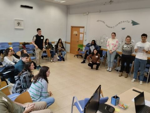 several people gathered in a classroom