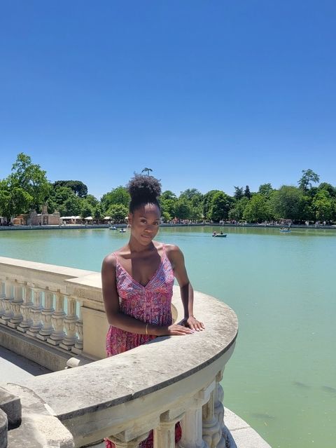 girl standing nearby retiro park