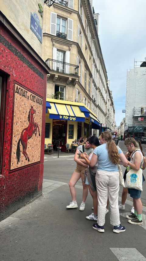 A group working together to solve the mysterious horse butcher mosaic clue