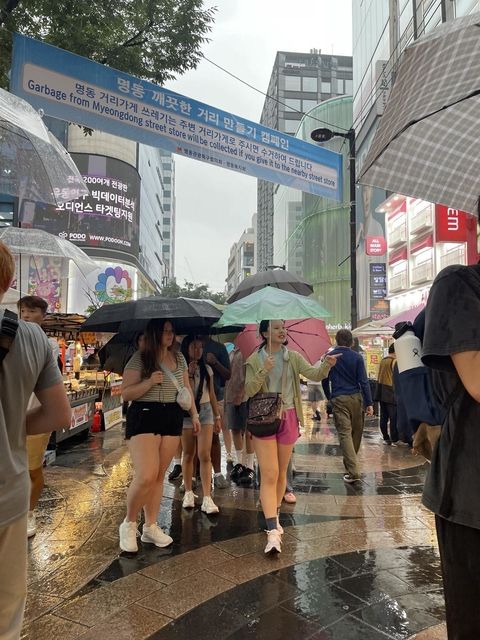 Students exploring Myeongdong, a popular walking district in Seoul