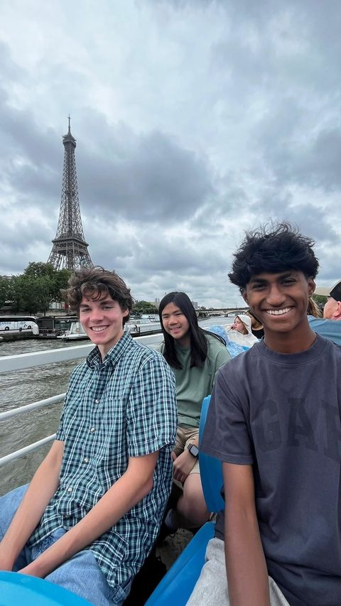 Students smiling on the boat tour