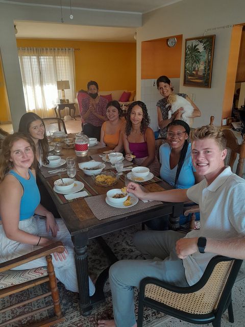 High school students eating with their homestay family