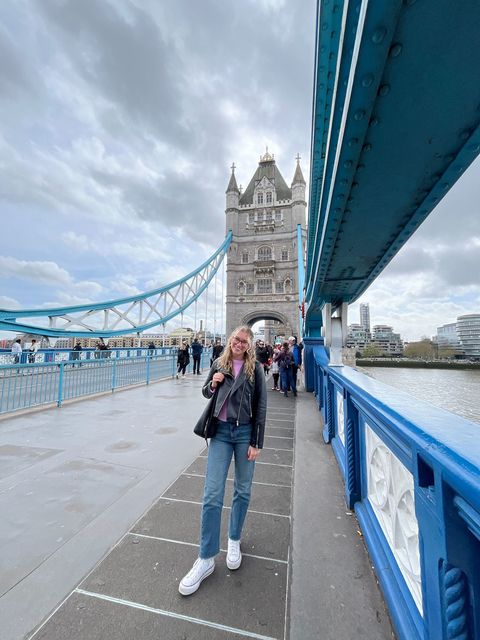 Student posing on Tower Bridge in London