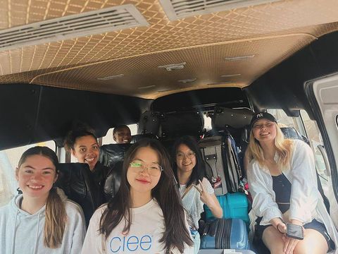 High school students posing in car on their way to a fun location