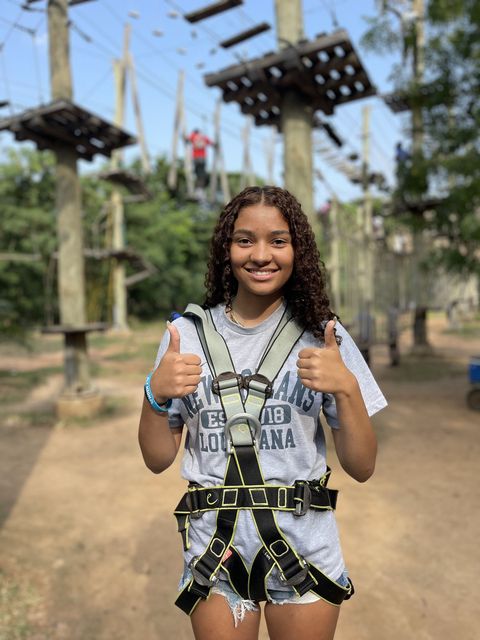 Student on high ropes course while studying abroad