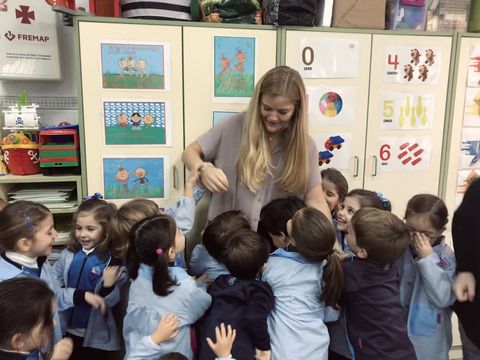 Teaching assistant with her young students in Spain