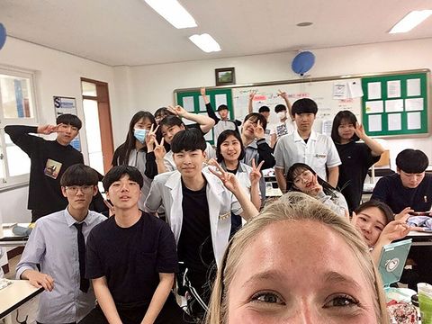 class full of smiling students in South Korea