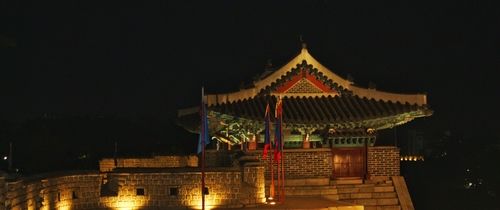 A picture of a Joseon era style building used as a watch tower within the walls of the Hwaseong Fortress located in Suwon, South Korea 