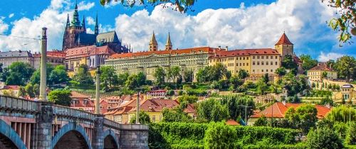 prague river bridge church hill