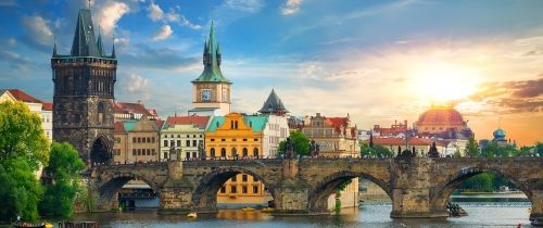 Prague river bridge sunset