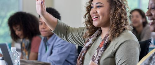 sa girl hand raised in classroom