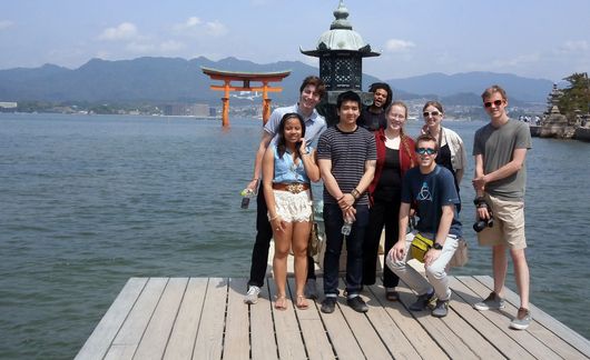 tokyo students on dock by ocean