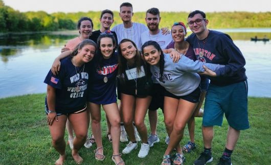 students during summer by lake